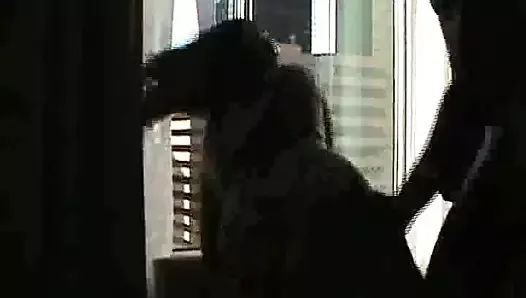 Follando su culo en la ventana