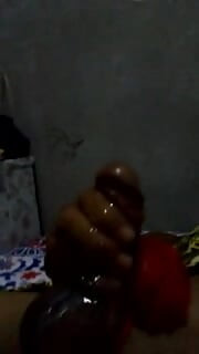 Anisha masturbates while wearing batik cloth