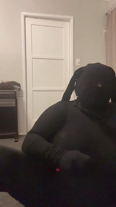 Rubber Doll Mask Encased Orgasm