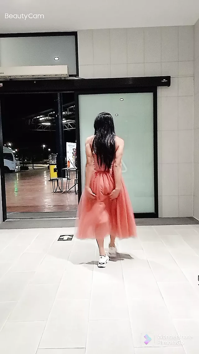 Mena in a beautiful dress