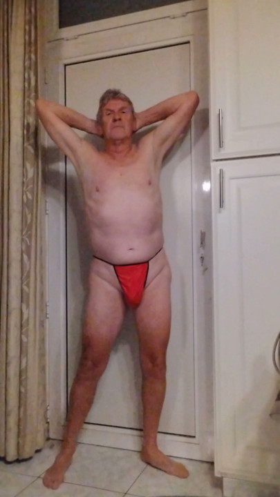 I reveal myself in a thong and perform a striptease.