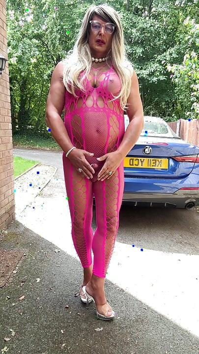 Sexy Crossdresser Kellycd2022's in pink fishnet catsuit and heels