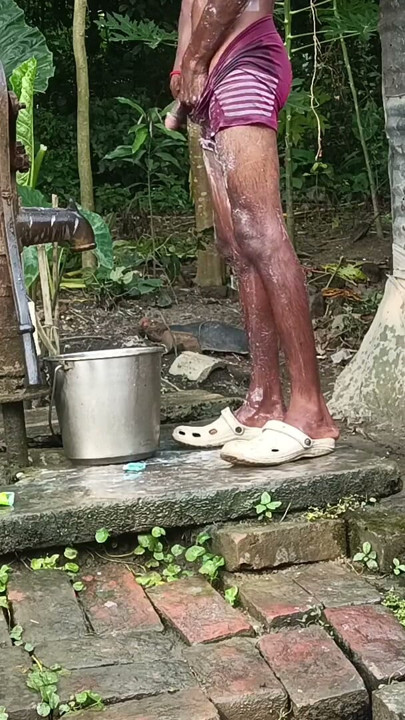 Black mature man bath in desi style. Showing big dick. | Clip 1