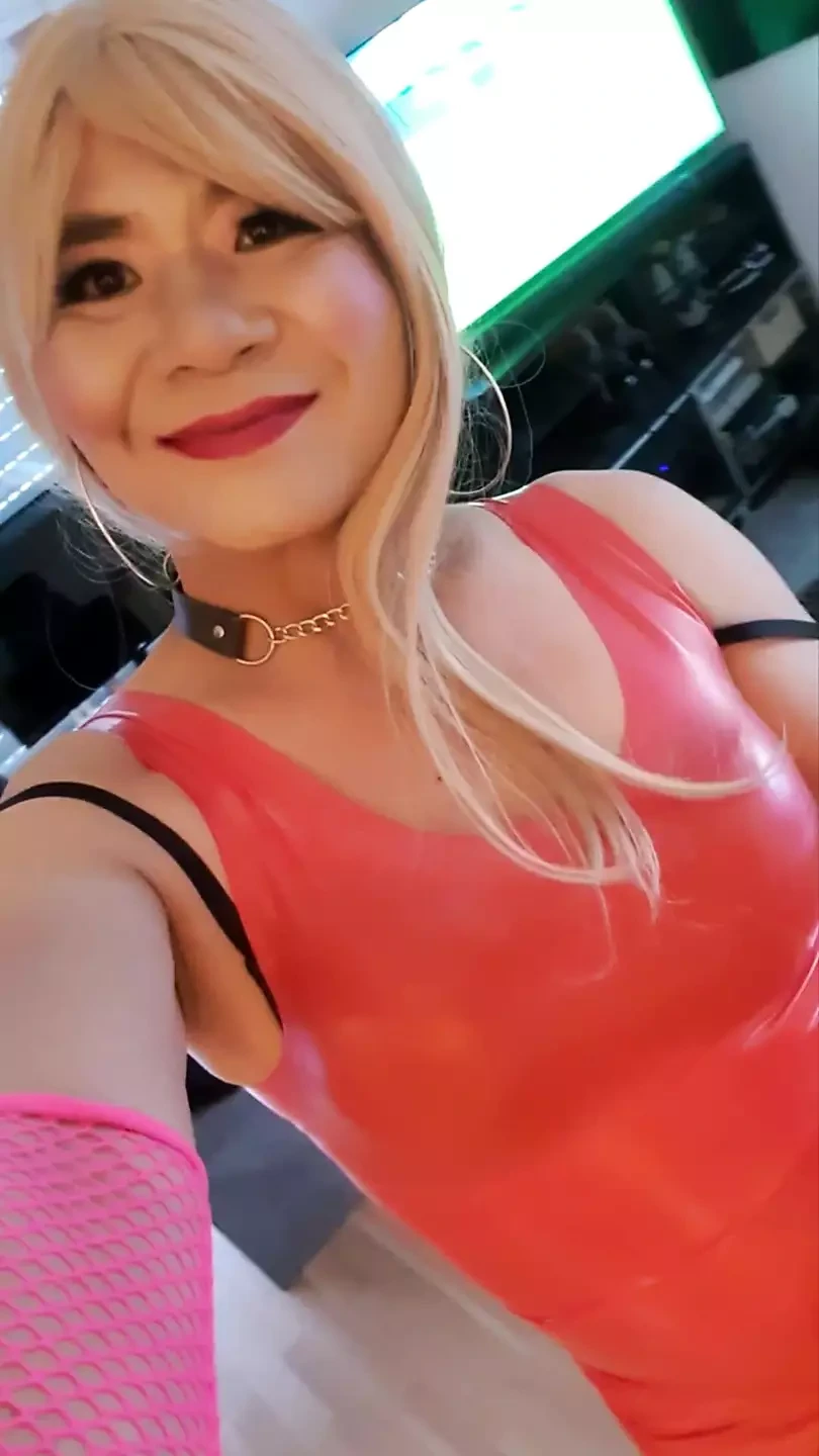 The Little Sissy in Red Latex Dress