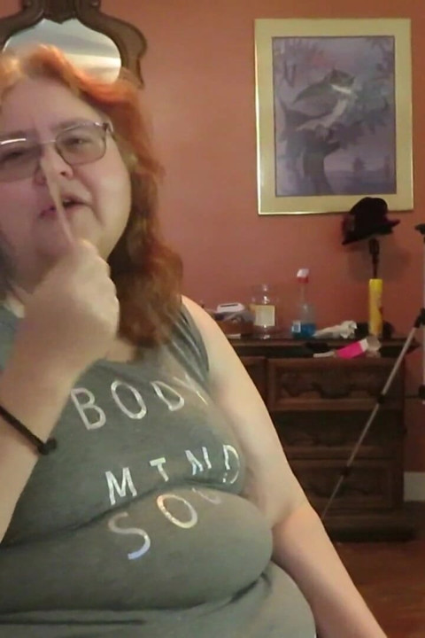 BBW nurse Vicki enjoys eatting a chocolate vanilla ice cream popsiscle