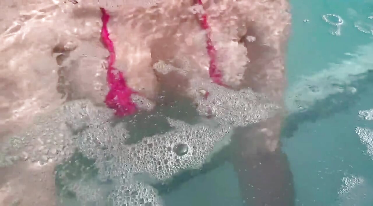 Artemisia Love Sexy and Horny Underwater Showing Her Big Tits in a Super Micro Bikini and You Can See Her Aureolas