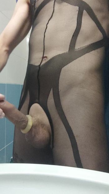 Young boy jerks off dick in nylons, jerks off in the bathroom