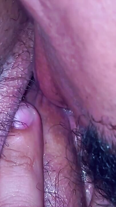 A lustful masseur caught the MILF off guard and licked her all over from behind, exploring her hairy pussy