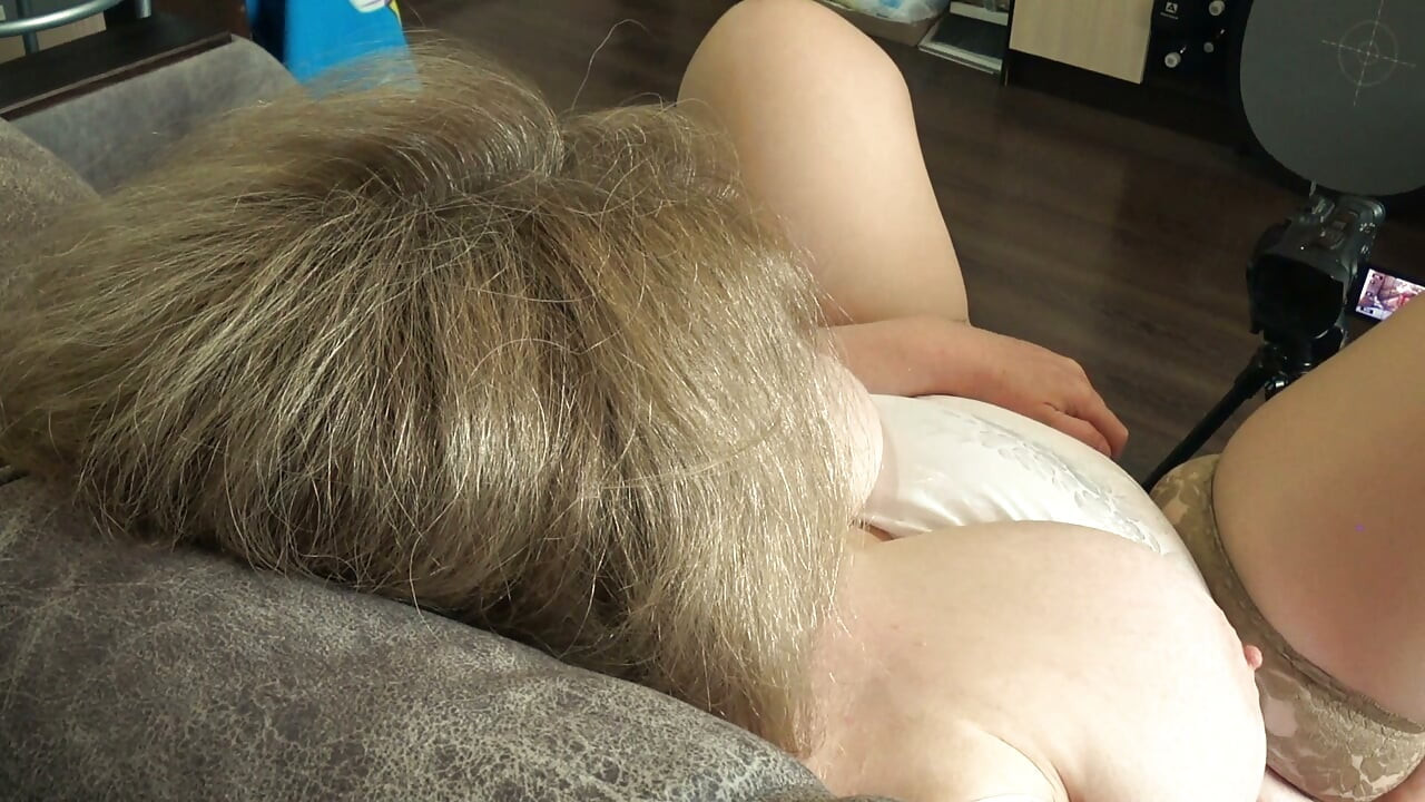 Big Tits From Above. a Camera Watches From the Side as a Plump MILF Masturbates and Records a Video.