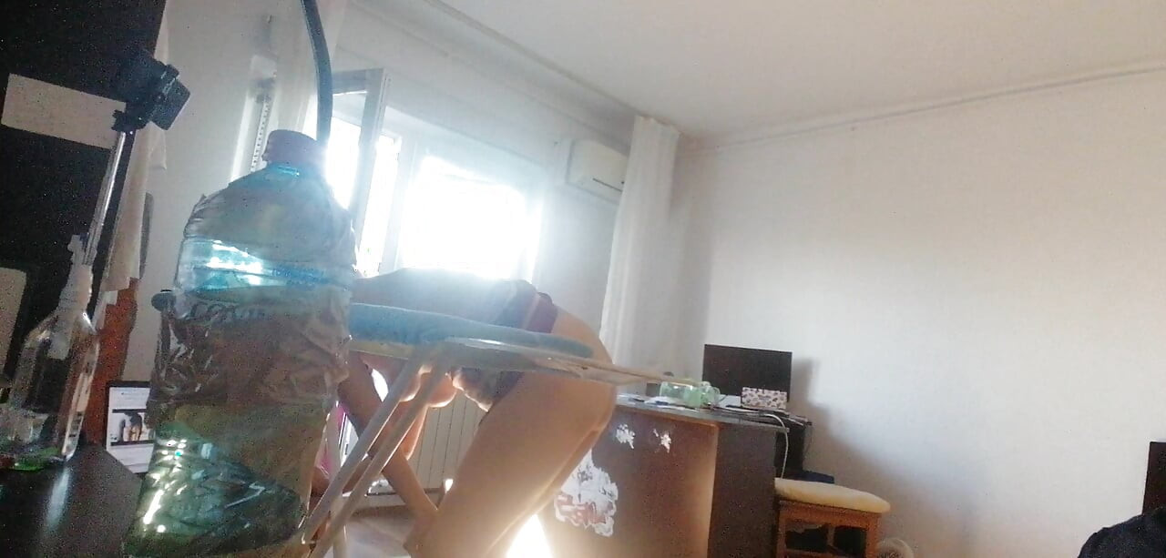 Amateur wife doing housework naked. Sexy and naughty wife trying on the clothes she cuts.