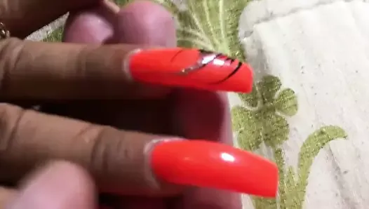 Latina with sexy long orange nails fingernails
