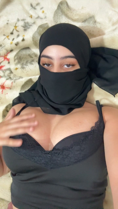 Muslim Girl in Hijab Lays in Bed and Gently Squeezes Her Arab Boobs While Her Titties Bounce Softly