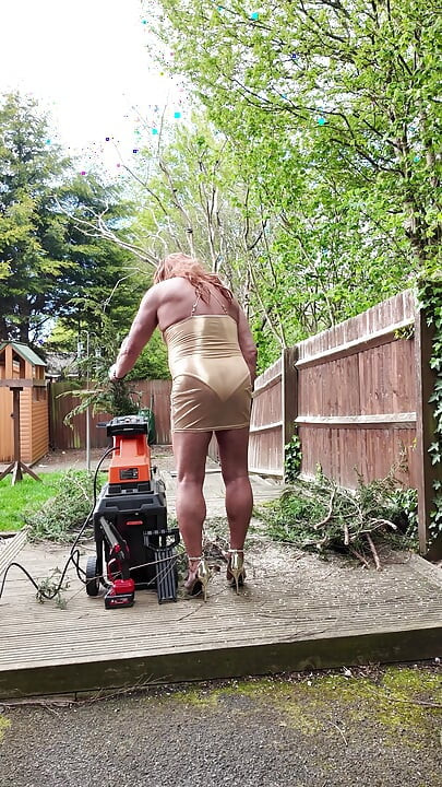 Sexy Crossdresser kellycd2022 in gold dress and heels out in the garden