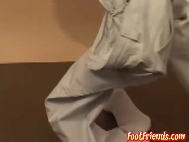 Six pack jock shows off his sexy feet and makes his cock cum