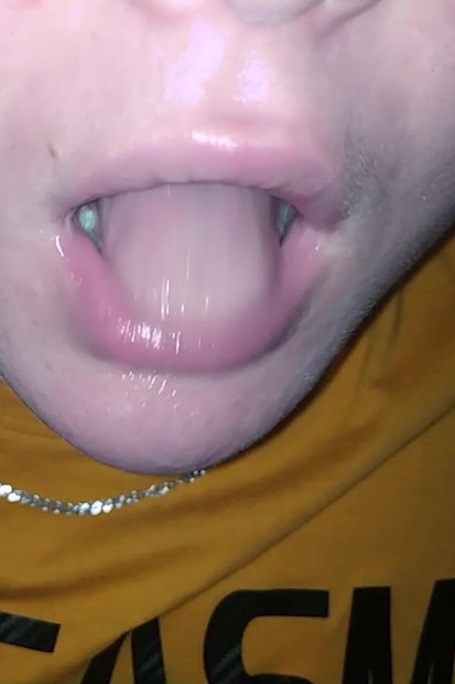 She swallows a mouthful of cum