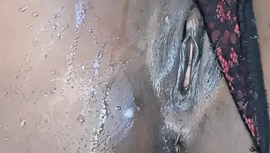 She tries to fit big black dildo in her small pussy