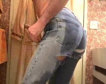 Rub his cock and wetting his jeans