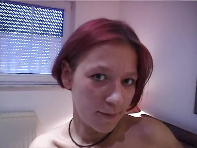 Redhead teen rubs and fingers her wet twat