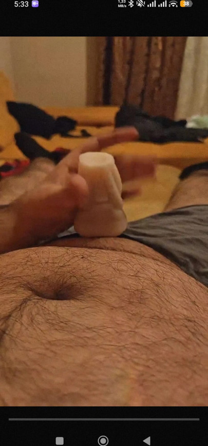 Solo guy using his toy and masturbating