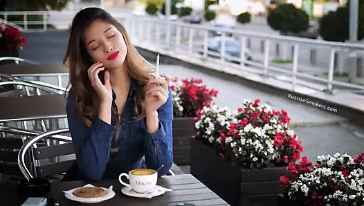 Magnetic Russian Beauty Playing with Cigarette Smoke