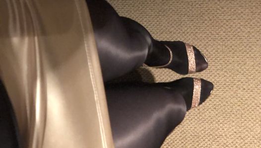 Teasing on cam wearing my black glossy tights and sexy high heels.