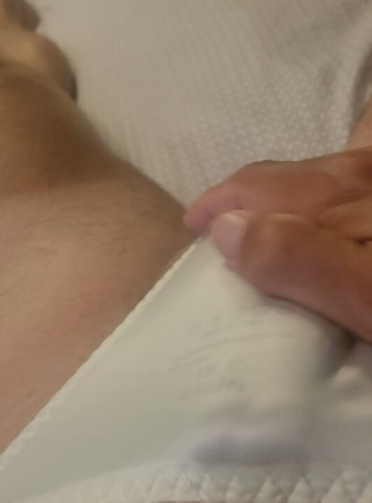 Sissy cums in his white satin panties.