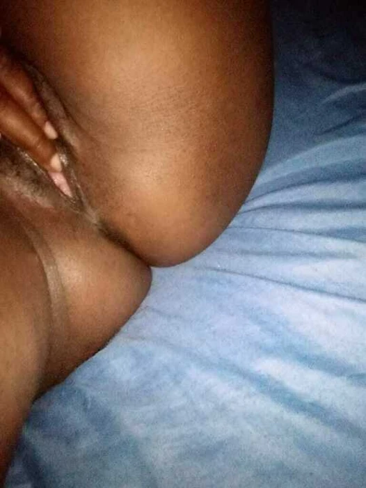 Horny African showing and touching herself