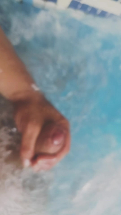 Cumshot in the hotel pool