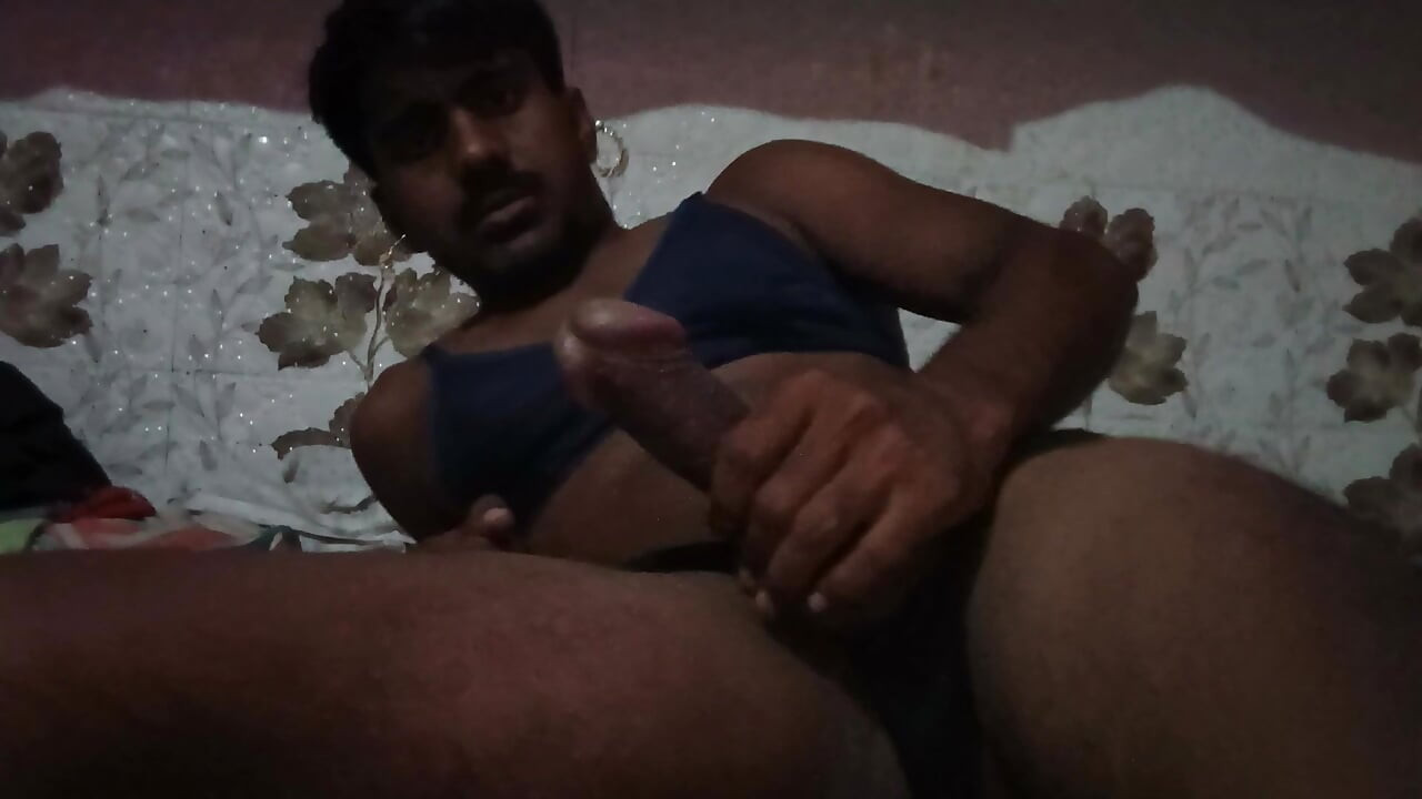 The man has a small and thick penis and is massaging it