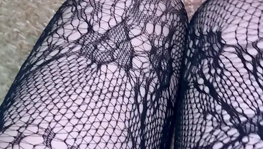 Long legs in black stockings snd boots