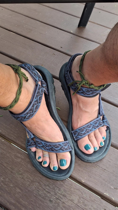 Kneel down in front of me and jerk your cock to my feet in sandals and toe rings