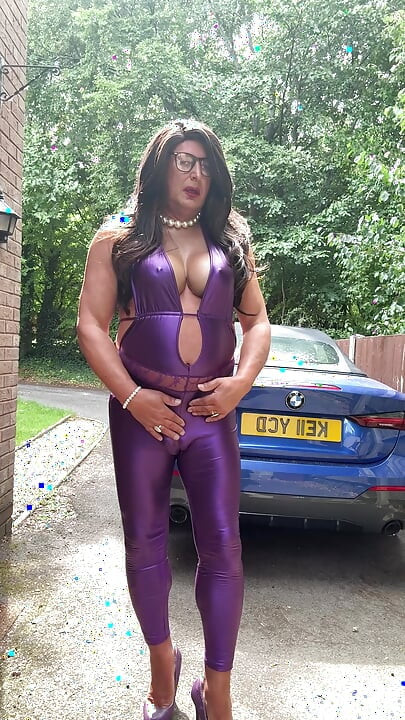 Sexy Crossdresser kellycd2022 in purple pvc catsuit and heels