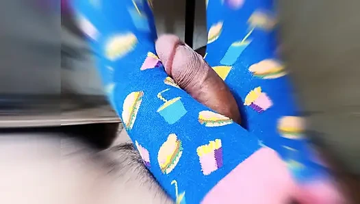 straw with feet wearing very funny stockings