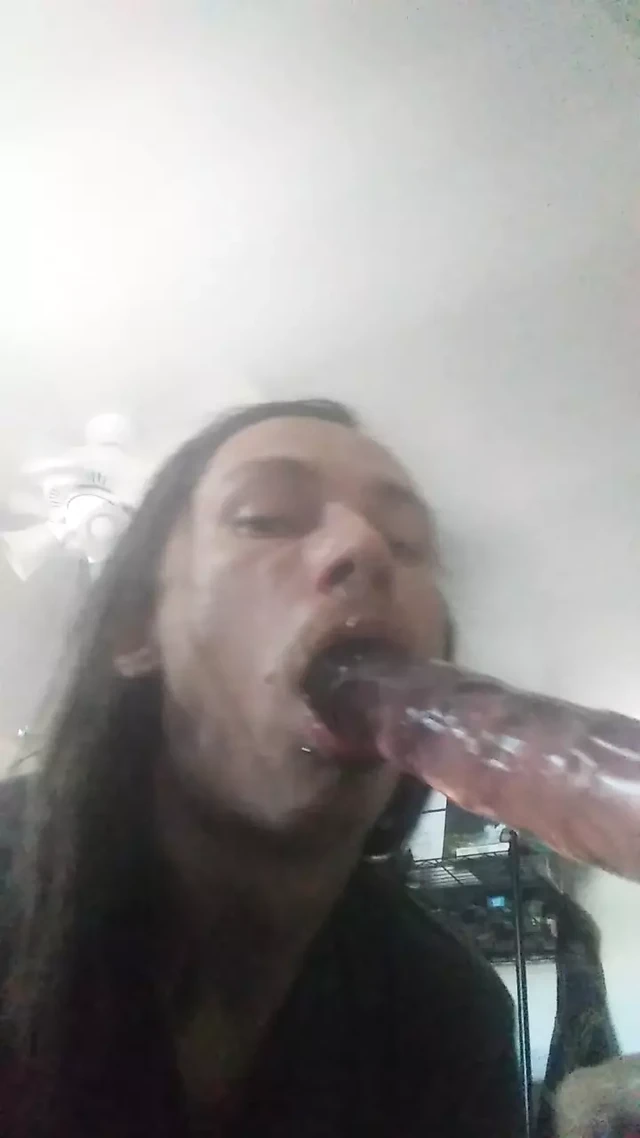 Sissy Mae deepthroats a dildo