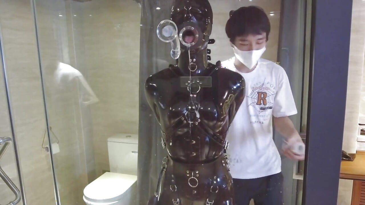 Mz20 - the Girl in Latex Clothing Locked in a Glass Room