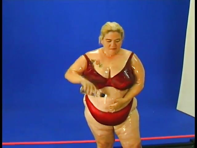An oiled hairy BBW fucks with her fucker