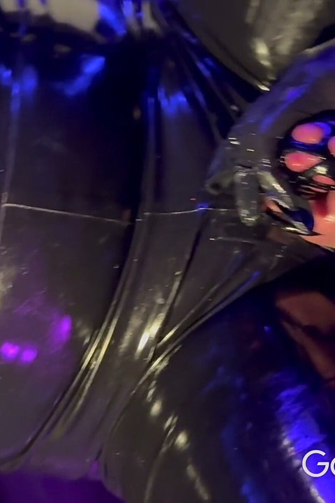 Rubber Gimp Pegged in Chastity