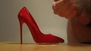 Cum Vengo su scarpe rosse con tacco