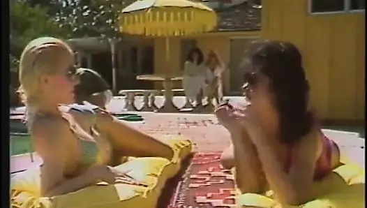 Hot babes enjoy as they give a huge pole a blowie outdoors then get fucked