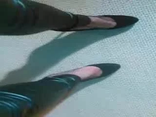 CD walking in pleather pants pov