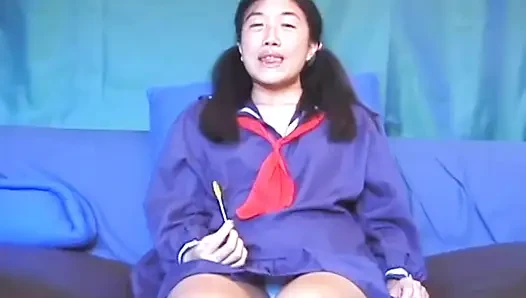 Asian petit on the cock in a college uniform