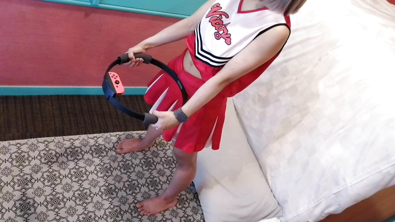 A cute, busty married woman does exercise 3 in a sexy cheerleader costume. Peeking down from above. Home made amateur Private Shoot