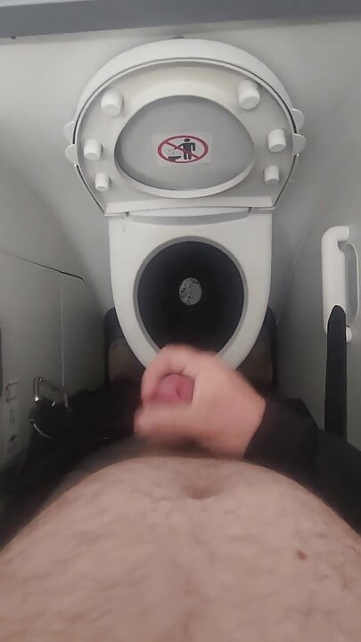 Airplane Bathroom Jerk and Cum.