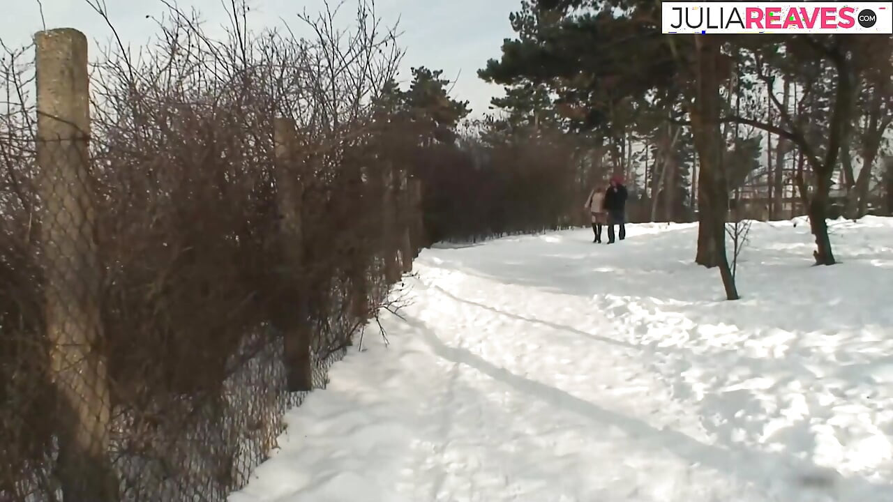 Sexy redhead rides a hard cock out in the cold snow