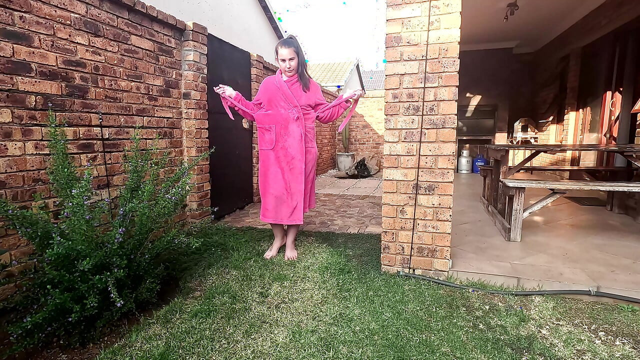 Chubby slut taking a piss on the rose bush