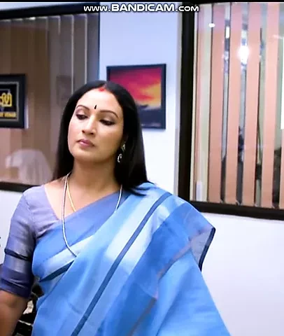 Beautiful Aunty with long hair and curves