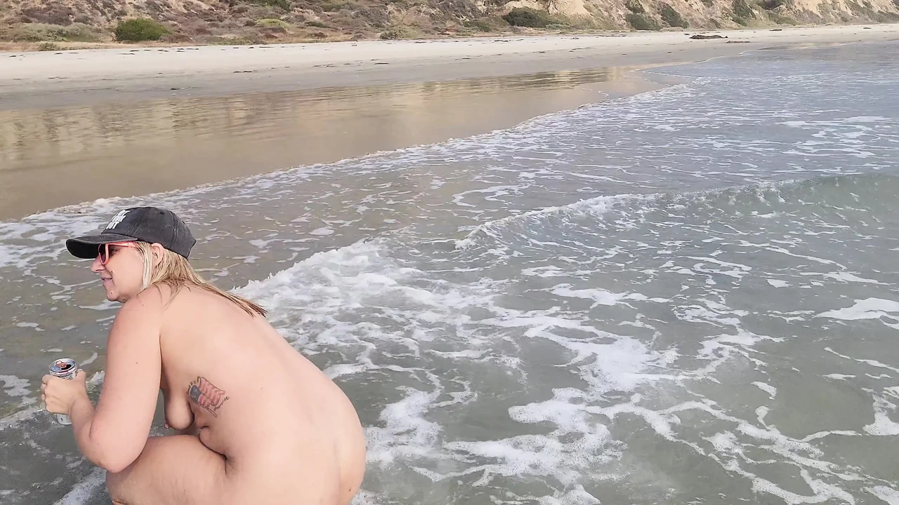 Playing at the nude beach.