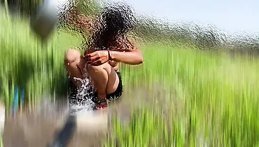 The desi stepsister of the village is bathing openly in the open field, bathing naked in the forest, brother-in-law is secretly