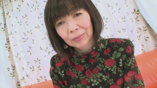 Asian MILF enjoys a big cock