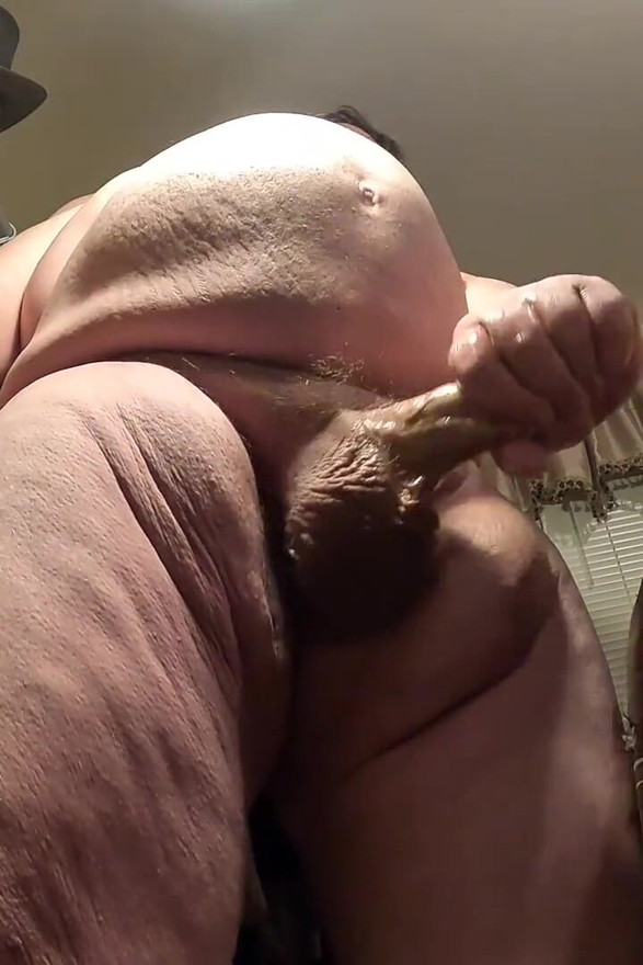 Big Bellied Bear Strokes His Huge Cock Until He Explodes Cum